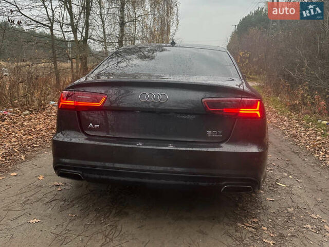 Черный Ауди А6, объемом двигателя 3 л и пробегом 199 тыс. км за 19800 $, фото 2 на Automoto.ua