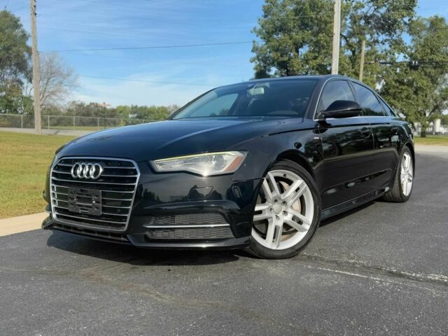 Чорний Ауді А6, об'ємом двигуна 2 л та пробігом 70 тис. км за 11600 $, фото 2 на Automoto.ua