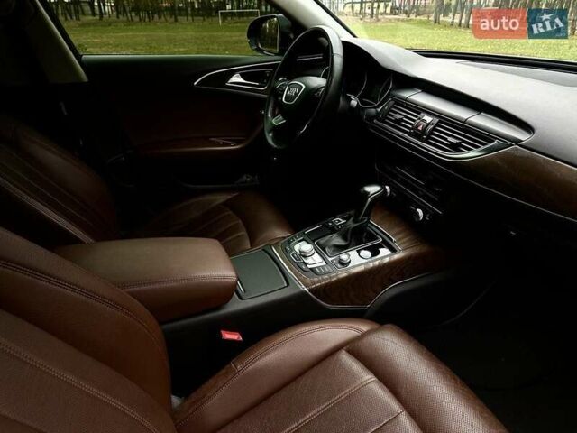 Черный Ауди А6, объемом двигателя 1.97 л и пробегом 106 тыс. км за 23000 $, фото 3 на Automoto.ua