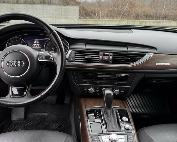 Черный Ауди А6, объемом двигателя 1.98 л и пробегом 179 тыс. км за 20500 $, фото 12 на Automoto.ua