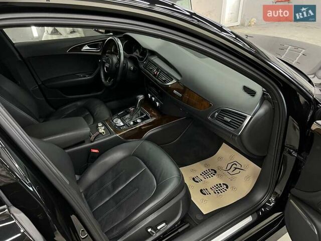 Черный Ауди А6, объемом двигателя 1.98 л и пробегом 148 тыс. км за 24000 $, фото 5 на Automoto.ua