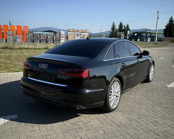 Черный Ауди А6, объемом двигателя 2 л и пробегом 91 тыс. км за 17300 $, фото 2 на Automoto.ua