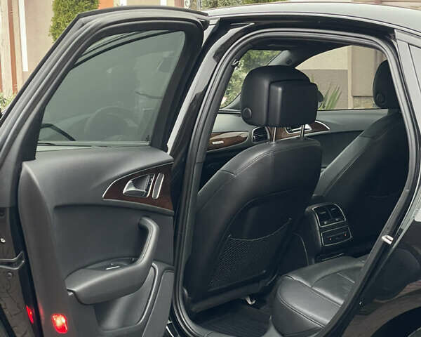 Черный Ауди А6, объемом двигателя 2 л и пробегом 193 тыс. км за 17850 $, фото 99 на Automoto.ua