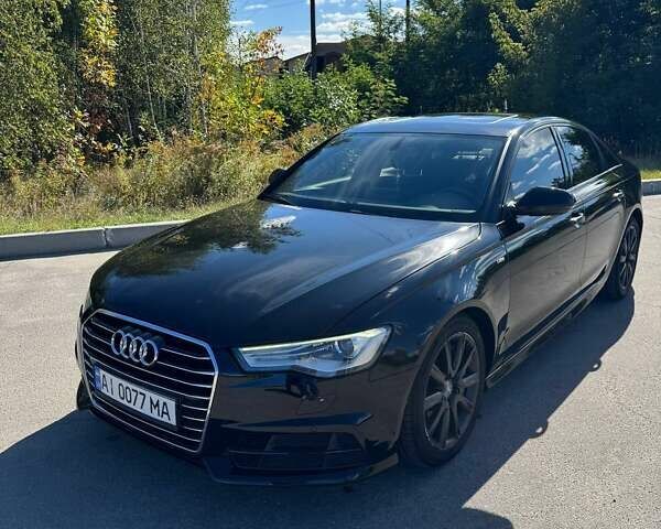 Черный Ауди А6, объемом двигателя 1.98 л и пробегом 206 тыс. км за 17500 $, фото 49 на Automoto.ua