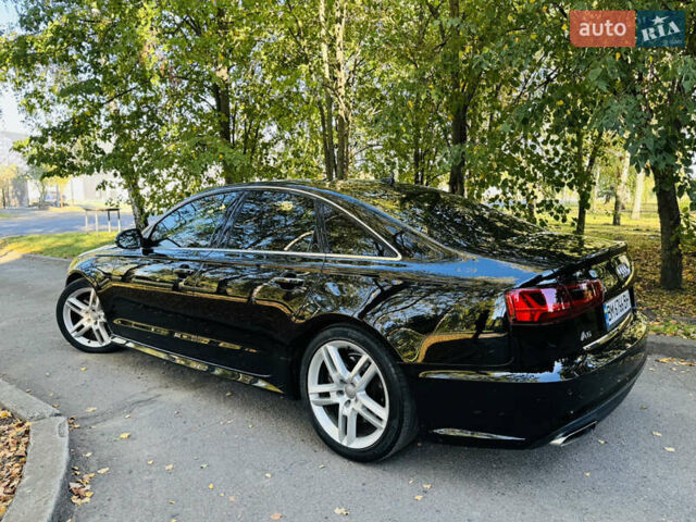 Черный Ауди А6, объемом двигателя 2 л и пробегом 68 тыс. км за 24500 $, фото 7 на Automoto.ua
