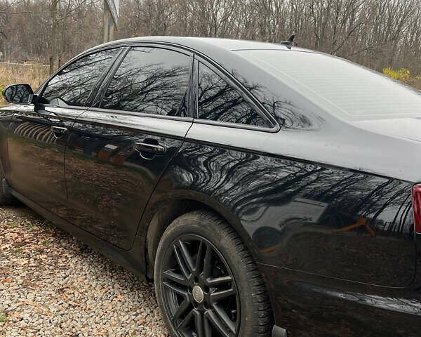 Черный Ауди А6, объемом двигателя 2 л и пробегом 124 тыс. км за 23500 $, фото 5 на Automoto.ua