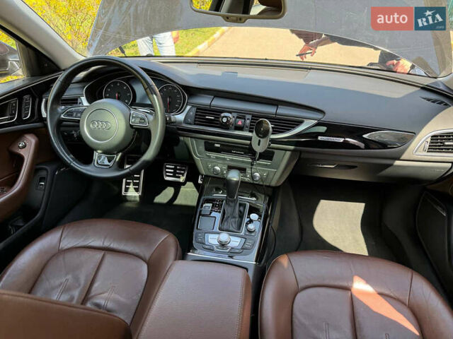 Черный Ауди А6, объемом двигателя 1.98 л и пробегом 70 тыс. км за 26500 $, фото 5 на Automoto.ua