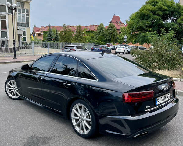 Черный Ауди А6, объемом двигателя 1.98 л и пробегом 165 тыс. км за 18500 $, фото 5 на Automoto.ua