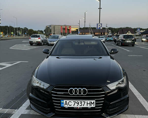 Черный Ауди А6, объемом двигателя 1.98 л и пробегом 205 тыс. км за 15900 $, фото 1 на Automoto.ua