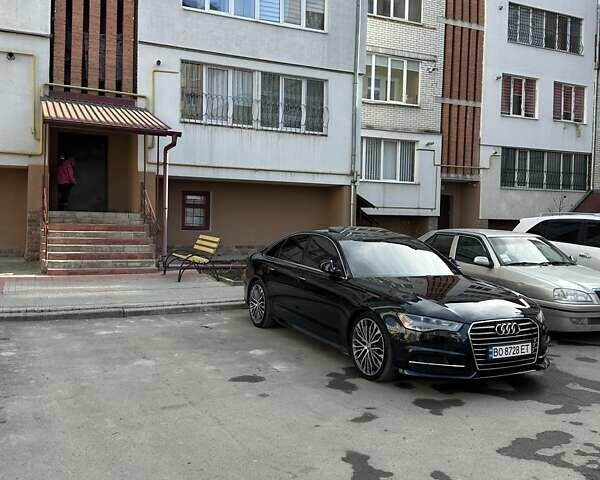 Черный Ауди А6, объемом двигателя 1.98 л и пробегом 149 тыс. км за 17000 $, фото 2 на Automoto.ua