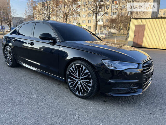 Чорний Ауді А6, об'ємом двигуна 2 л та пробігом 33 тис. км за 29500 $, фото 1 на Automoto.ua