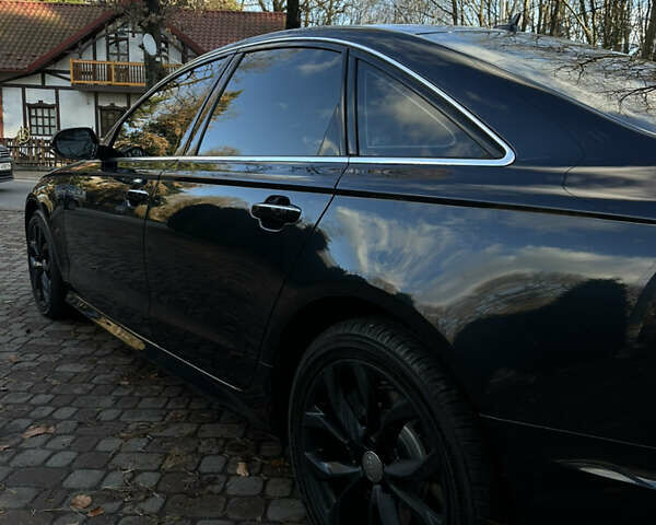 Чорний Ауді А6, об'ємом двигуна 1.98 л та пробігом 185 тис. км за 18499 $, фото 2 на Automoto.ua
