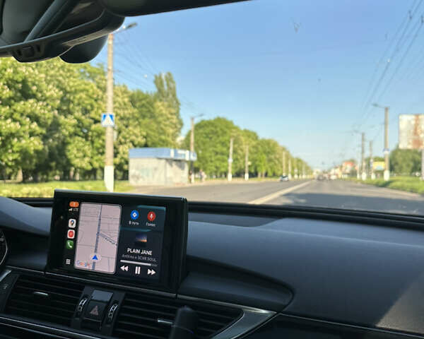 Черный Ауди А6, объемом двигателя 1.98 л и пробегом 70 тыс. км за 26500 $, фото 7 на Automoto.ua