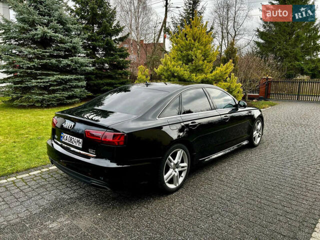 Черный Ауди А6, объемом двигателя 1.98 л и пробегом 155 тыс. км за 21000 $, фото 3 на Automoto.ua