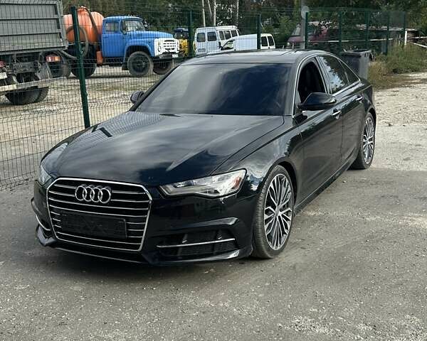 Черный Ауди А6, объемом двигателя 1.98 л и пробегом 149 тыс. км за 17000 $, фото 1 на Automoto.ua