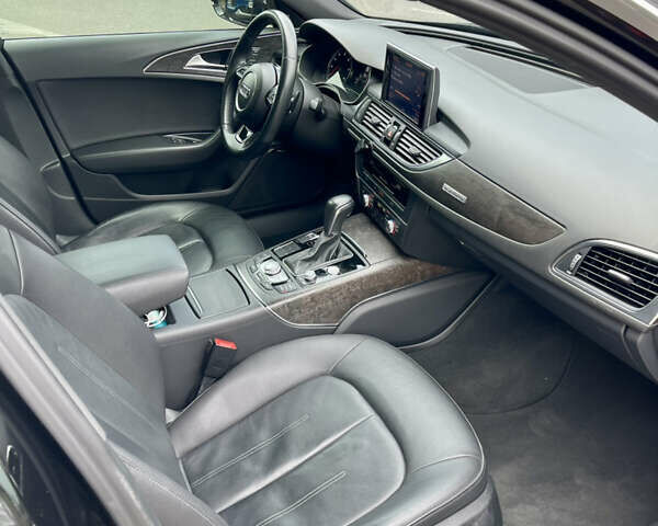 Черный Ауди А6, объемом двигателя 1.98 л и пробегом 165 тыс. км за 18500 $, фото 9 на Automoto.ua