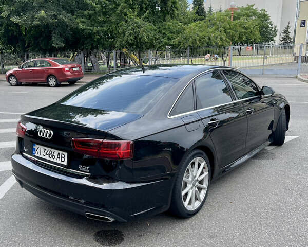 Черный Ауди А6, объемом двигателя 1.98 л и пробегом 165 тыс. км за 18500 $, фото 3 на Automoto.ua