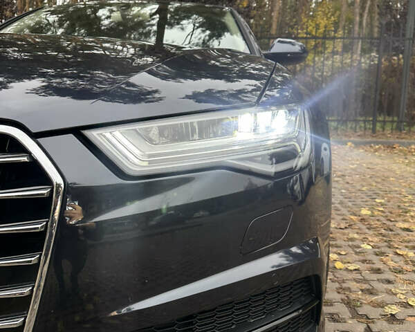 Чорний Ауді А6, об'ємом двигуна 1.98 л та пробігом 75 тис. км за 23700 $, фото 23 на Automoto.ua