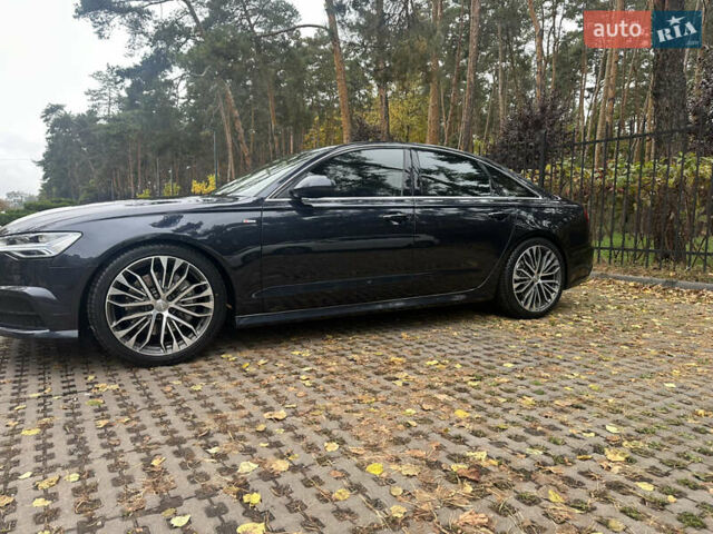 Чорний Ауді А6, об'ємом двигуна 1.98 л та пробігом 75 тис. км за 23700 $, фото 5 на Automoto.ua
