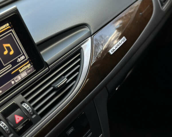 Чорний Ауді А6, об'ємом двигуна 1.98 л та пробігом 185 тис. км за 18499 $, фото 13 на Automoto.ua