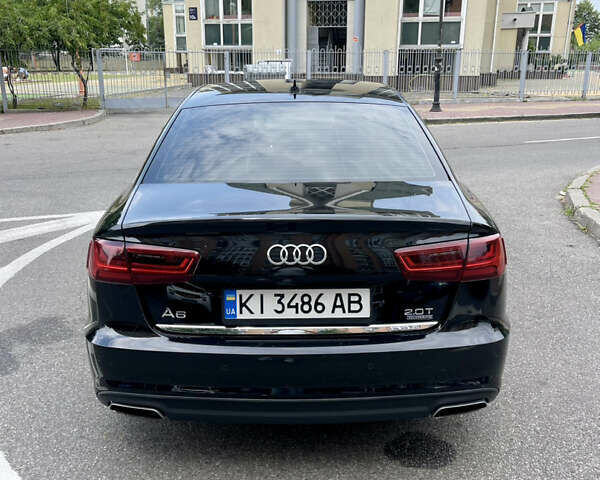 Черный Ауди А6, объемом двигателя 1.98 л и пробегом 165 тыс. км за 18500 $, фото 4 на Automoto.ua