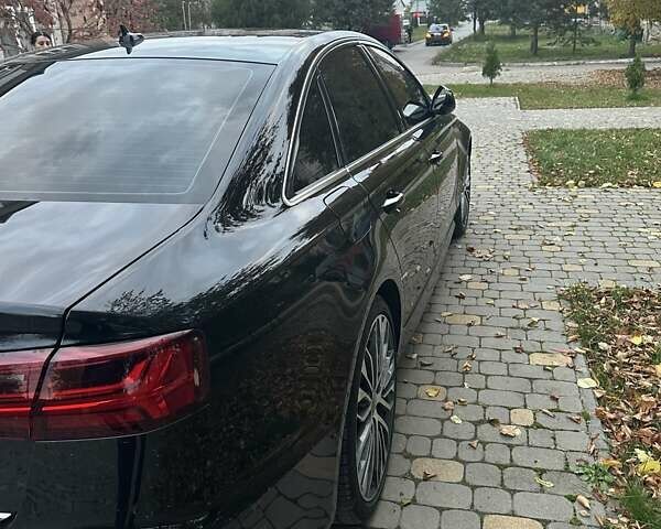 Черный Ауди А6, объемом двигателя 1.98 л и пробегом 149 тыс. км за 17000 $, фото 6 на Automoto.ua