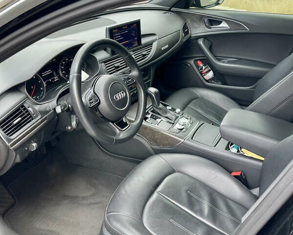 Черный Ауди А6, объемом двигателя 1.98 л и пробегом 165 тыс. км за 18500 $, фото 8 на Automoto.ua