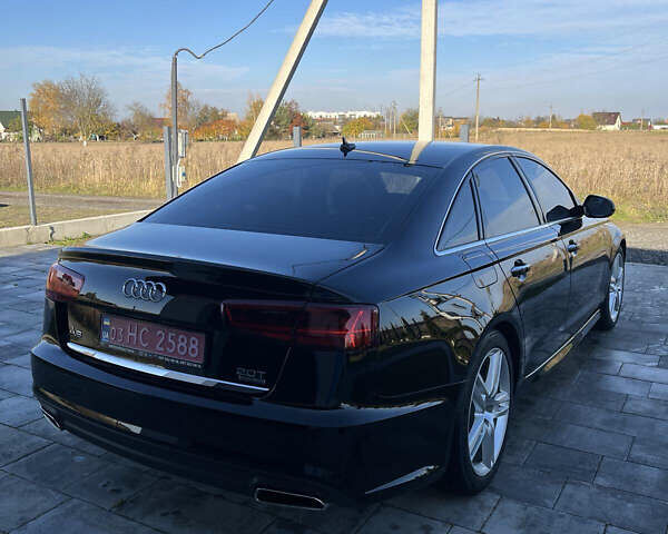 Черный Ауди А6, объемом двигателя 2 л и пробегом 162 тыс. км за 19200 $, фото 4 на Automoto.ua