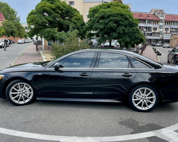 Черный Ауди А6, объемом двигателя 1.98 л и пробегом 165 тыс. км за 18500 $, фото 6 на Automoto.ua