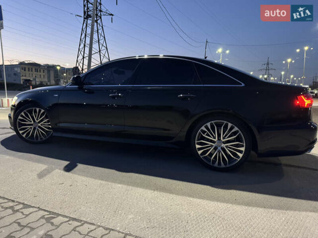 Черный Ауди А6, объемом двигателя 1.98 л и пробегом 84 тыс. км за 23000 $, фото 5 на Automoto.ua