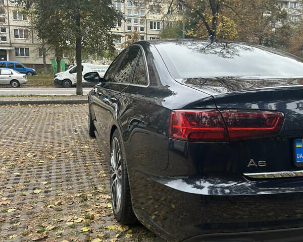 Чорний Ауді А6, об'ємом двигуна 1.98 л та пробігом 75 тис. км за 23700 $, фото 6 на Automoto.ua