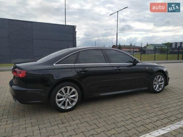 Чорний Ауді А6, об'ємом двигуна 1.98 л та пробігом 142 тис. км за 18800 $, фото 5 на Automoto.ua