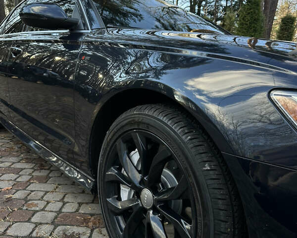 Чорний Ауді А6, об'ємом двигуна 1.98 л та пробігом 185 тис. км за 18499 $, фото 5 на Automoto.ua