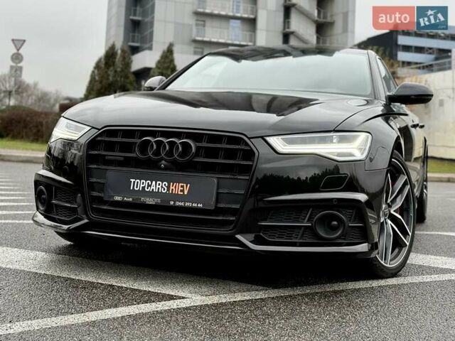 Черный Ауди А6, объемом двигателя 3 л и пробегом 56 тыс. км за 31990 $, фото 1 на Automoto.ua