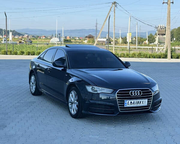 Черный Ауди А6, объемом двигателя 2 л и пробегом 240 тыс. км за 16800 $, фото 1 на Automoto.ua