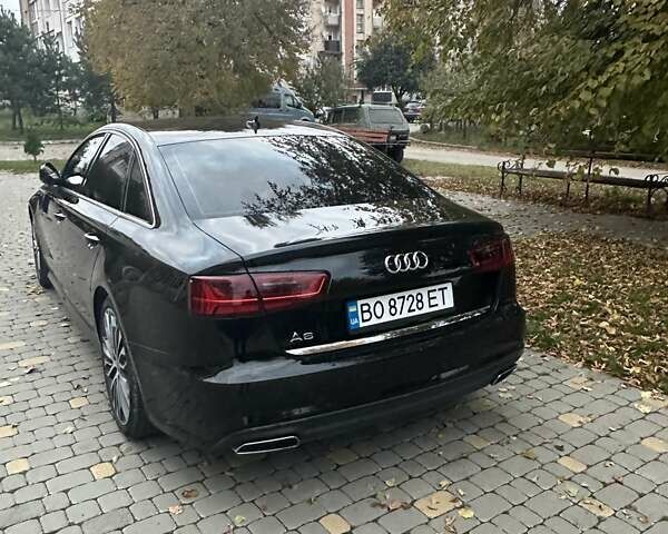 Черный Ауди А6, объемом двигателя 1.98 л и пробегом 149 тыс. км за 17000 $, фото 11 на Automoto.ua