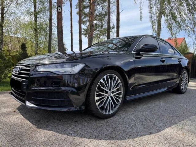 Черный Ауди А6, объемом двигателя 2 л и пробегом 127 тыс. км за 12000 $, фото 1 на Automoto.ua