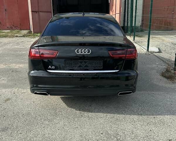 Черный Ауди А6, объемом двигателя 1.98 л и пробегом 149 тыс. км за 17000 $, фото 14 на Automoto.ua