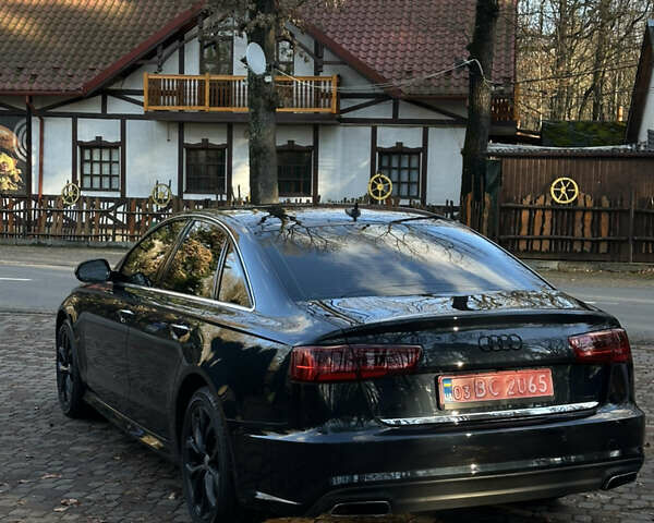 Чорний Ауді А6, об'ємом двигуна 1.98 л та пробігом 185 тис. км за 18499 $, фото 1 на Automoto.ua