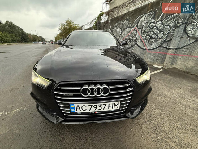 Черный Ауди А6, объемом двигателя 1.98 л и пробегом 200 тыс. км за 16700 $, фото 1 на Automoto.ua