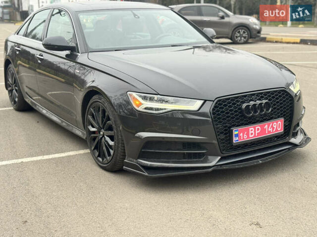 Черный Ауди А6, объемом двигателя 1.98 л и пробегом 86 тыс. км за 18800 $, фото 2 на Automoto.ua