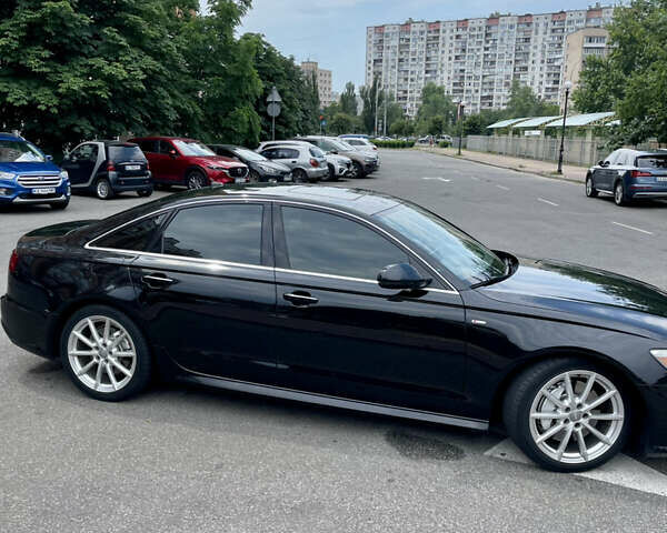Черный Ауди А6, объемом двигателя 1.98 л и пробегом 165 тыс. км за 18500 $, фото 2 на Automoto.ua
