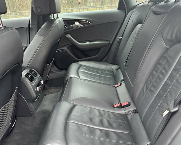 Черный Ауди А6, объемом двигателя 1.98 л и пробегом 86 тыс. км за 18800 $, фото 13 на Automoto.ua