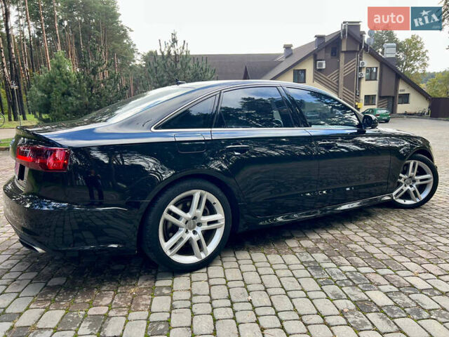 Чорний Ауді А6, об'ємом двигуна 2 л та пробігом 141 тис. км за 23000 $, фото 1 на Automoto.ua