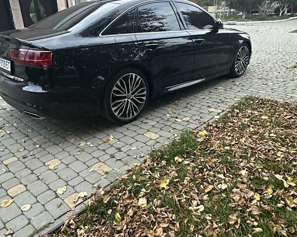 Черный Ауди А6, объемом двигателя 1.98 л и пробегом 149 тыс. км за 17000 $, фото 9 на Automoto.ua