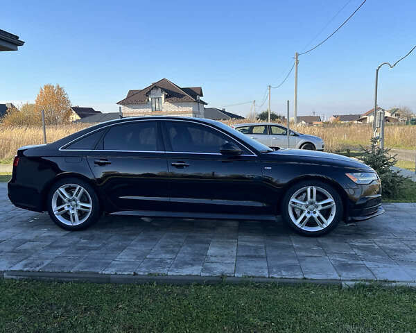 Черный Ауди А6, объемом двигателя 2 л и пробегом 162 тыс. км за 19200 $, фото 3 на Automoto.ua