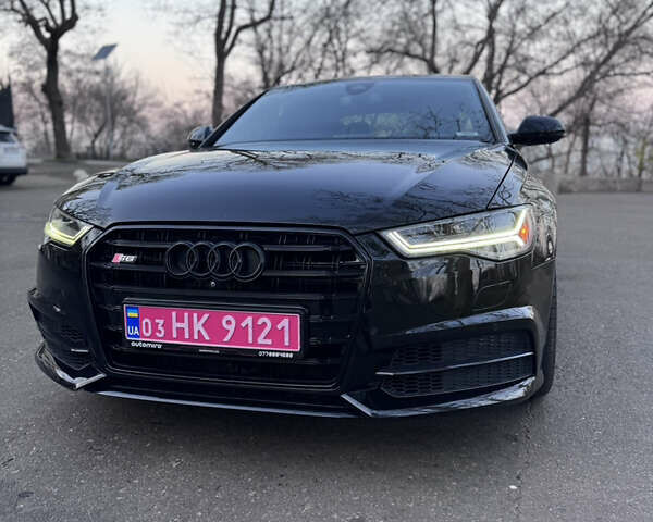 Черный Ауди А6, объемом двигателя 3 л и пробегом 230 тыс. км за 16900 $, фото 1 на Automoto.ua