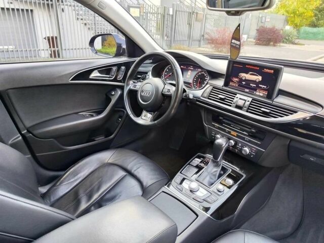 Черный Ауди А6, объемом двигателя 2 л и пробегом 117 тыс. км за 12700 $, фото 12 на Automoto.ua