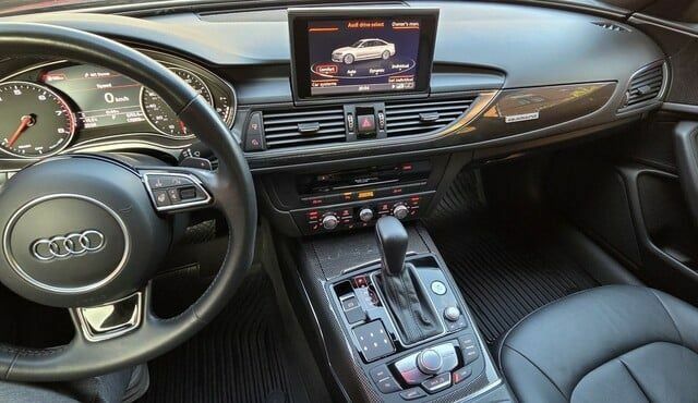 Черный Ауди А6, объемом двигателя 3 л и пробегом 129 тыс. км за 13800 $, фото 6 на Automoto.ua