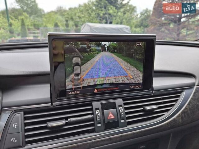 Черный Ауди А6, объемом двигателя 1.98 л и пробегом 100 тыс. км за 23500 $, фото 14 на Automoto.ua